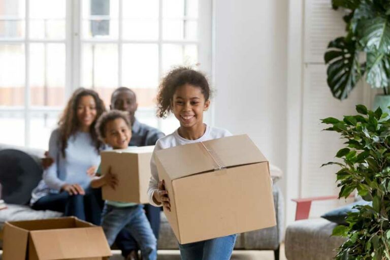 kids carrying boxes